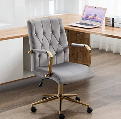 Stylish gray office chair with gold armrests for modern offices.